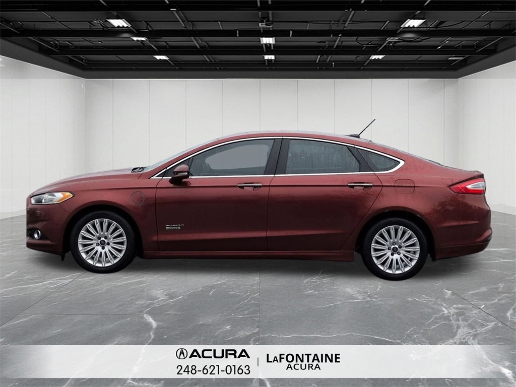 Used 2014 Ford Fusion Energi SE Luxury with VIN 3FA6P0PU9ER155853 for sale in Commerce Charter Township, MI