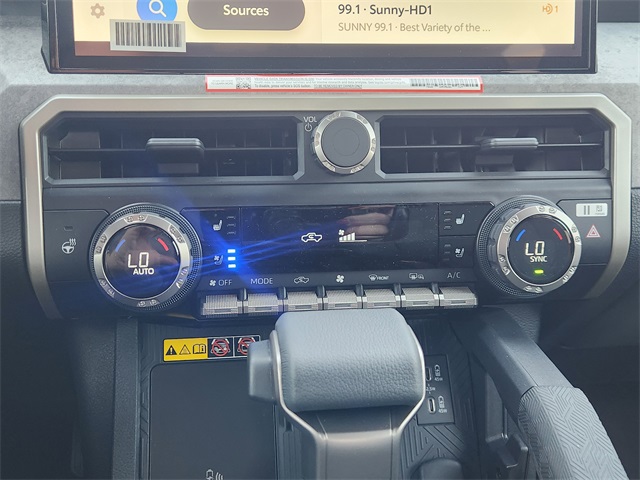 2025 Toyota Tacoma Hybrid Trailhunter White at Classic Toyota Galveston