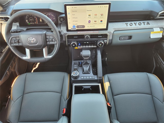 2025 Toyota Tacoma Hybrid Trailhunter White at Classic Toyota Galveston