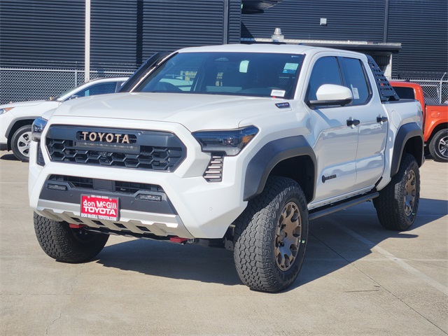 2025 Toyota Tacoma Hybrid Trailhunter White at Classic Toyota Galveston