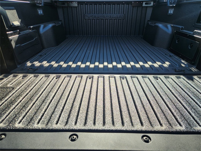 2025 Toyota Tacoma Hybrid Trailhunter White at Classic Toyota Galveston