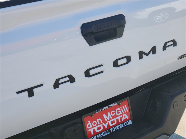 2025 Toyota Tacoma Hybrid Trailhunter White at Classic Toyota Galveston