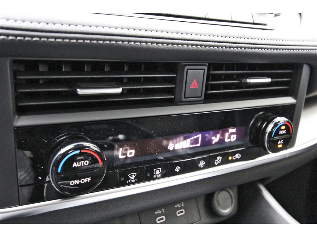 2026 Nissan Rogue SV White at Central Houston Nissan