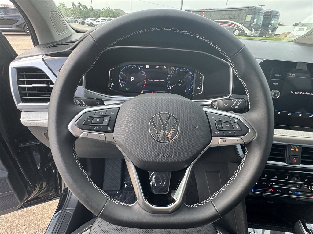 2025 Volkswagen Taos 1.5T SEL Black at DeMontrond Auto Country