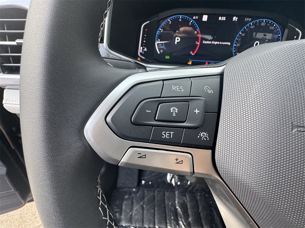 2025 Volkswagen Taos 1.5T SEL Black at DeMontrond Auto Country