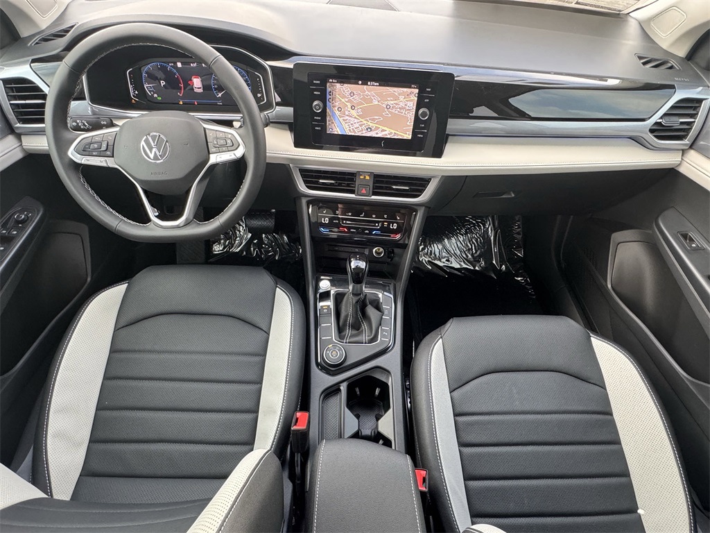 2025 Volkswagen Taos 1.5T SEL Black at DeMontrond Auto Country