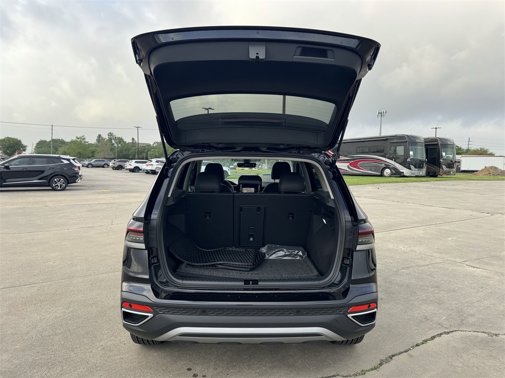 2025 Volkswagen Taos 1.5T SEL Black at DeMontrond Auto Country