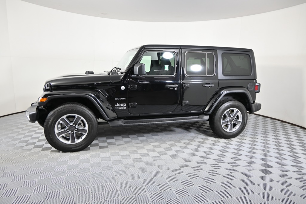 Used 2022 Jeep Wrangler Unlimited Sahara with VIN 1C4HJXEG9NW226816 for sale in Forest Lake, Minnesota