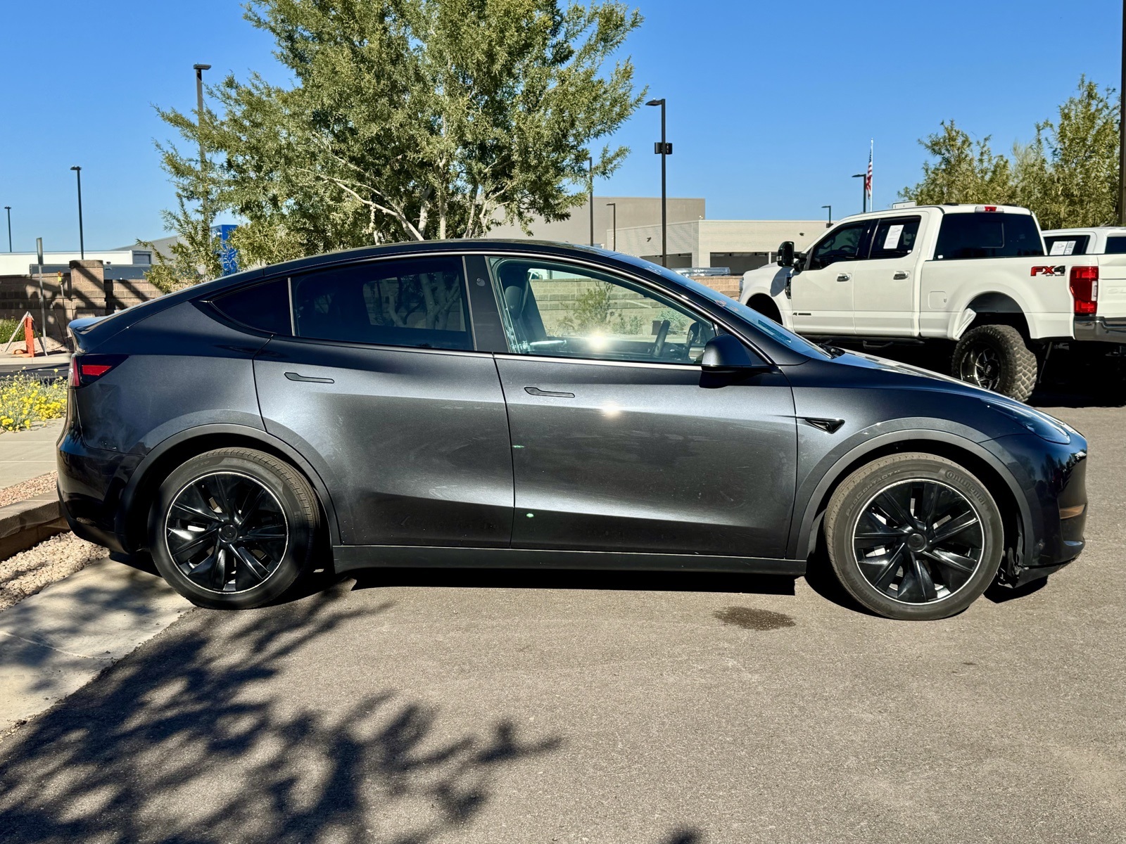Used 2024 Tesla Model Y Long Range with VIN 7SAYGAEE4RF016325 for sale in Scottsdale, AZ