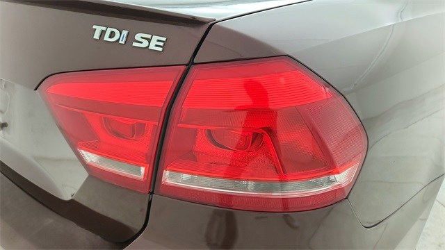 2013 Volkswagen Passat TDI SE Red at DeMontrond Gulf Freeway