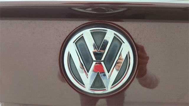2013 Volkswagen Passat TDI SE Red at DeMontrond Gulf Freeway