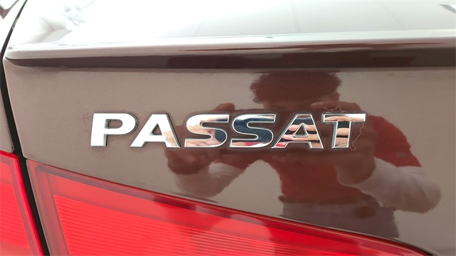 2013 Volkswagen Passat TDI SE Red at DeMontrond Gulf Freeway