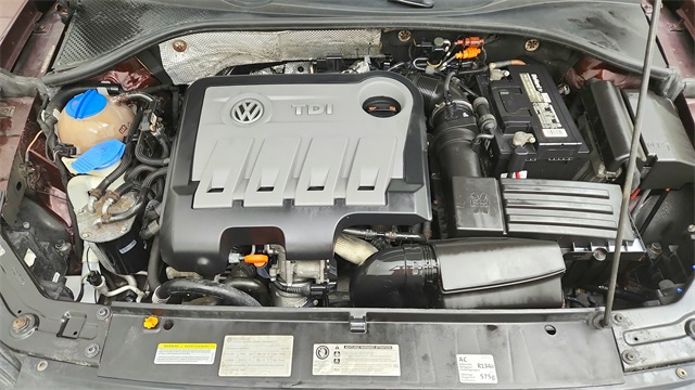 2013 Volkswagen Passat TDI SE Red at DeMontrond Gulf Freeway
