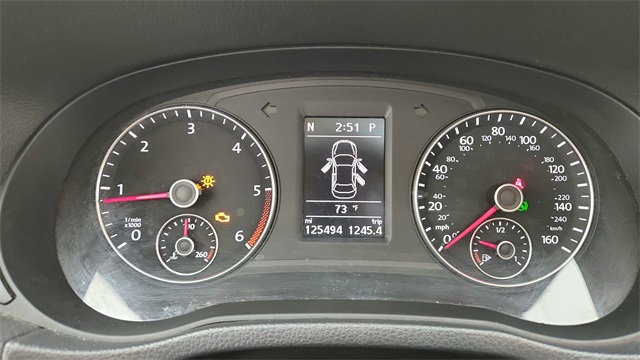 2013 Volkswagen Passat TDI SE Red at DeMontrond Gulf Freeway