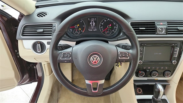 2013 Volkswagen Passat TDI SE Red at DeMontrond Gulf Freeway