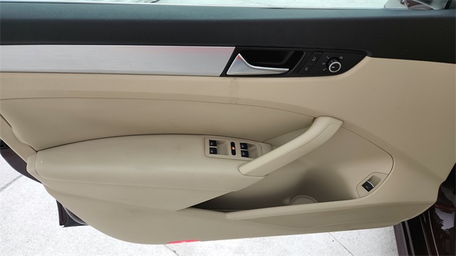 2013 Volkswagen Passat TDI SE Red at DeMontrond Gulf Freeway