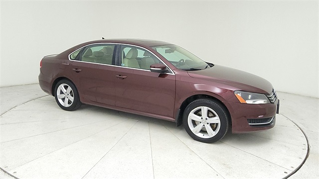2013 Volkswagen Passat TDI SE Red at DeMontrond Gulf Freeway