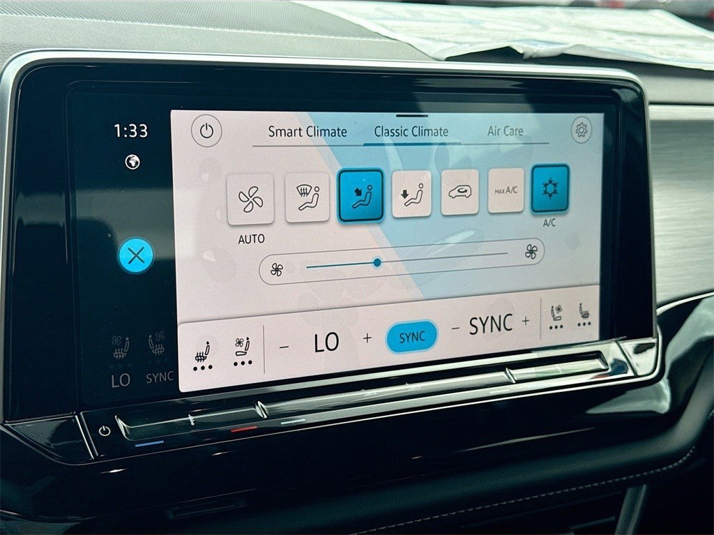 2025 Volkswagen Atlas Cross Sport 2.0T SE w/Technology White at DeMontrond Automotive Group