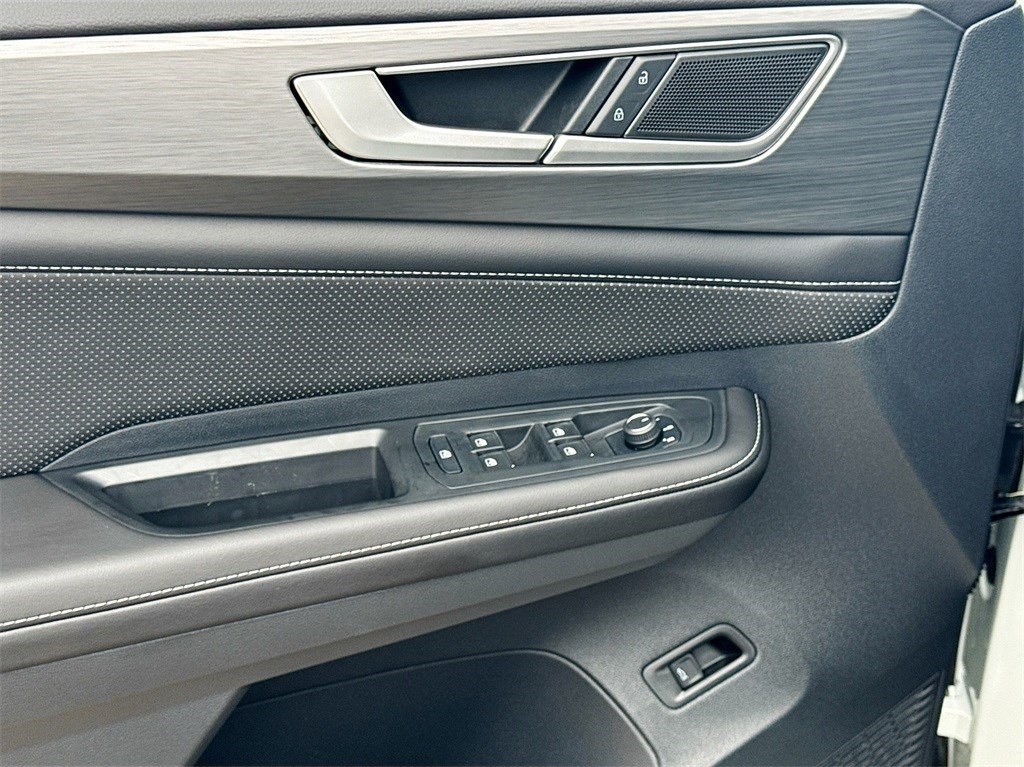 2025 Volkswagen Atlas Cross Sport 2.0T SE w/Technology White at DeMontrond Automotive Group