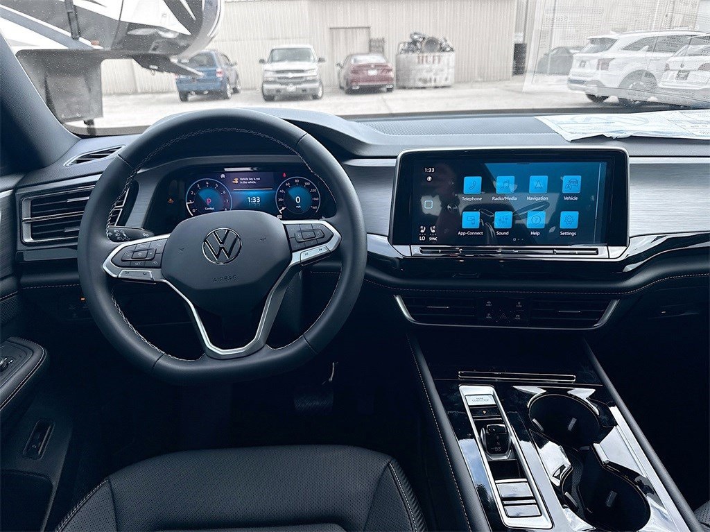 2025 Volkswagen Atlas Cross Sport 2.0T SE w/Technology White at DeMontrond Automotive Group