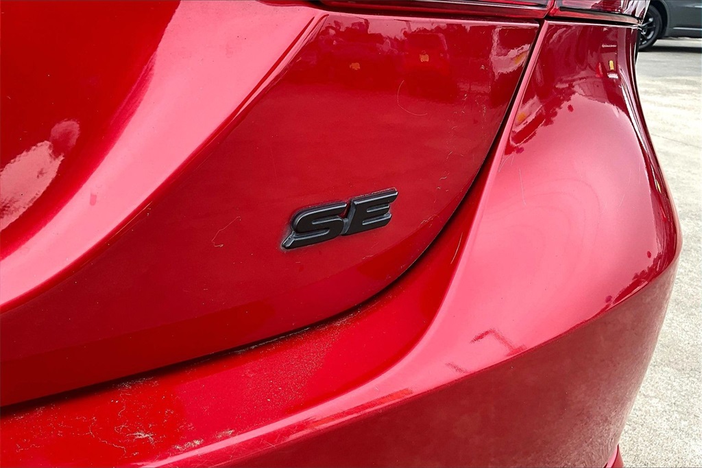 2023 Toyota Camry SE Red at DeMontrond Auto Country