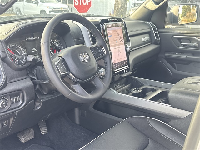 2025 Ram 1500 Laramie White at Tom Peacock Cadillac