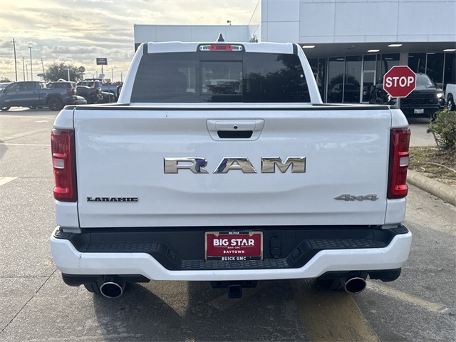 2025 Ram 1500 Laramie White at Tom Peacock Cadillac