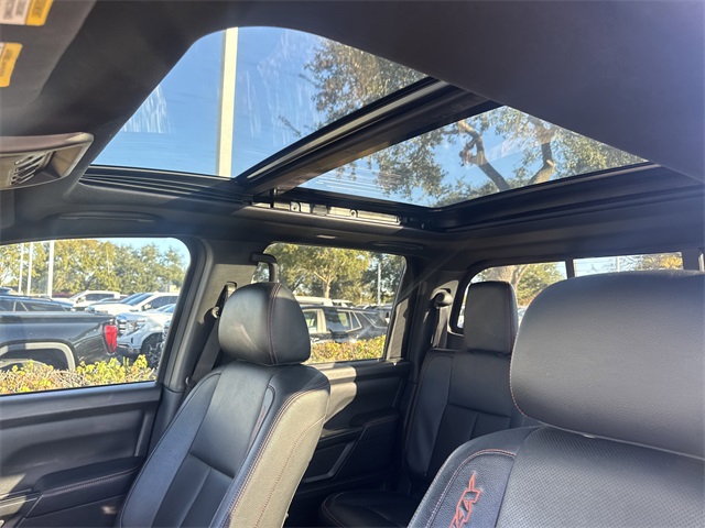 2023 Nissan Titan PRO-4X Red at AutoSavvy Houston Northwest