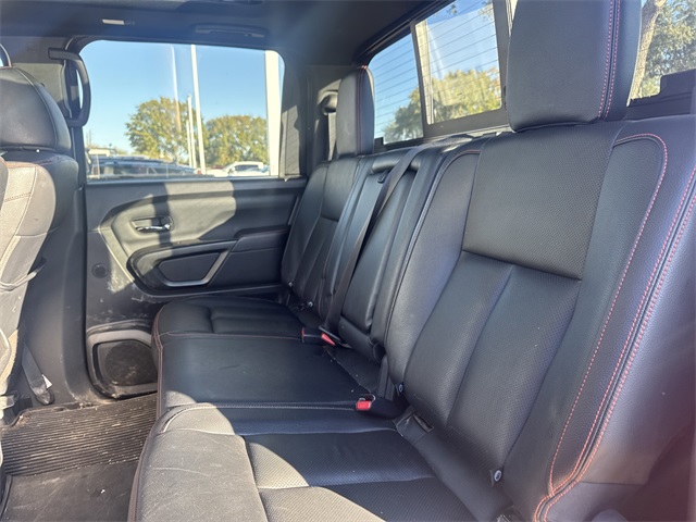 2023 Nissan Titan PRO-4X Red at AutoSavvy Houston Northwest