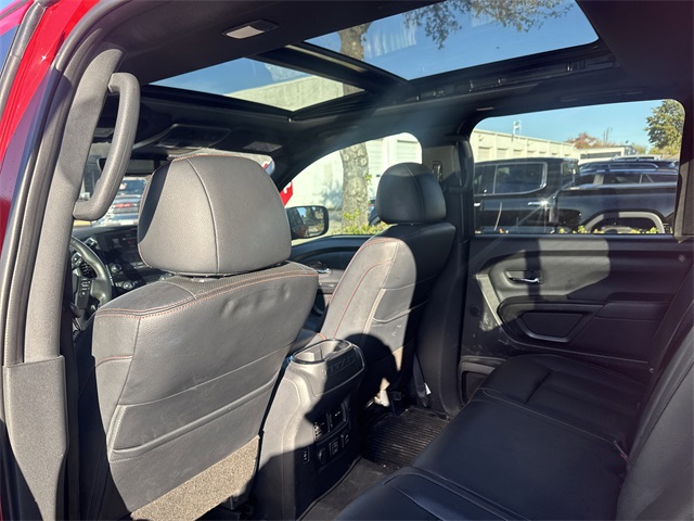 2023 Nissan Titan PRO-4X Red at AutoSavvy Houston Northwest