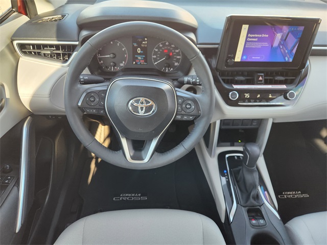 2024 Toyota Corolla Cross LE Red at AutoSavvy Houston Southwest