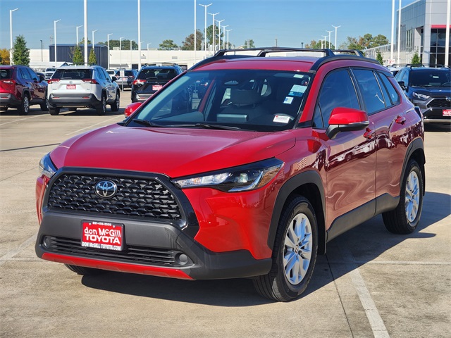 2024 Toyota Corolla Cross LE Red at AutoSavvy Houston Southwest