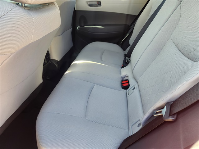 2024 Toyota Corolla Cross LE Red at AutoSavvy Houston Southwest