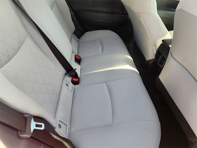 2024 Toyota Corolla Cross LE Red at AutoSavvy Houston Southwest