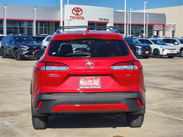 2024 Toyota Corolla Cross LE Red at AutoSavvy Houston Southwest