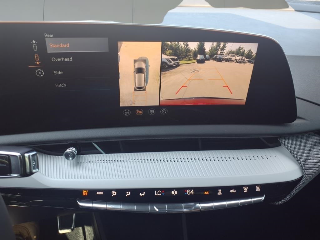 2025 Cadillac OPTIQ Sport 2 Red at Tom Peacock Cadillac