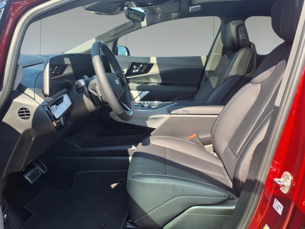 2025 Cadillac OPTIQ Sport 2 Red at Tom Peacock Cadillac