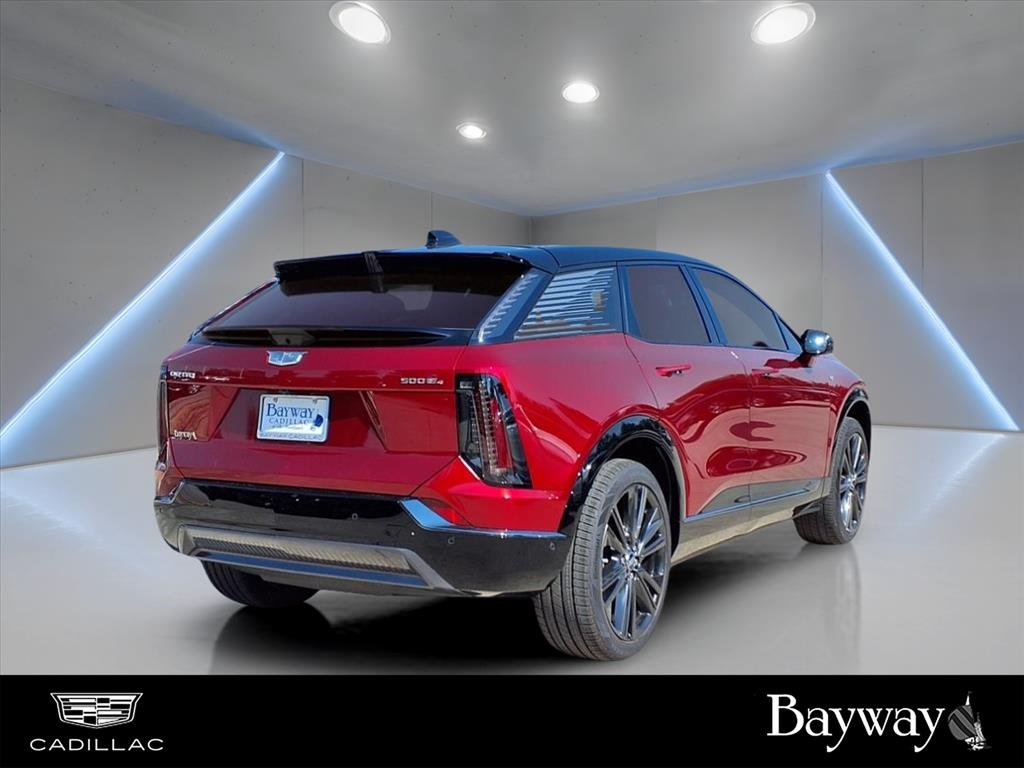 2025 Cadillac OPTIQ Sport 2 Red at Tom Peacock Cadillac