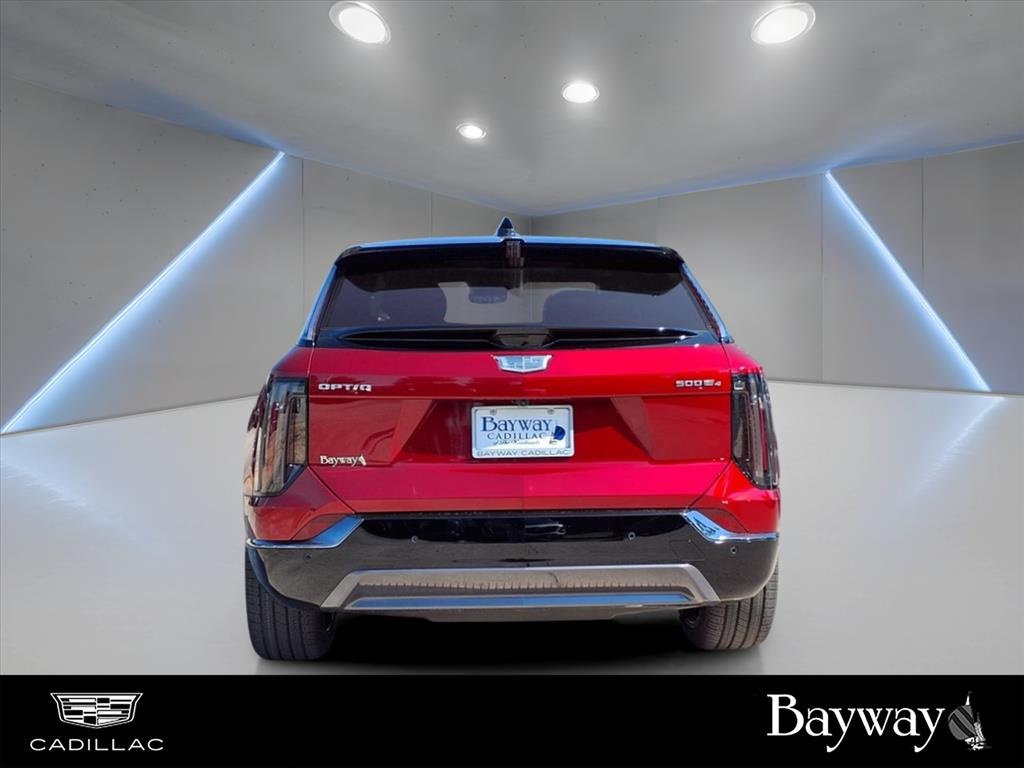 2025 Cadillac OPTIQ Sport 2 Red at Tom Peacock Cadillac