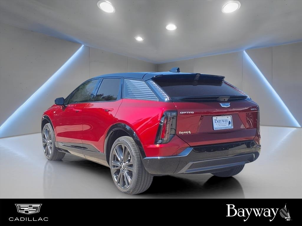 2025 Cadillac OPTIQ Sport 2 Red at Tom Peacock Cadillac