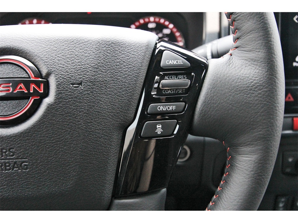 2025 Nissan Frontier PRO-4X Orange at Central Houston Nissan