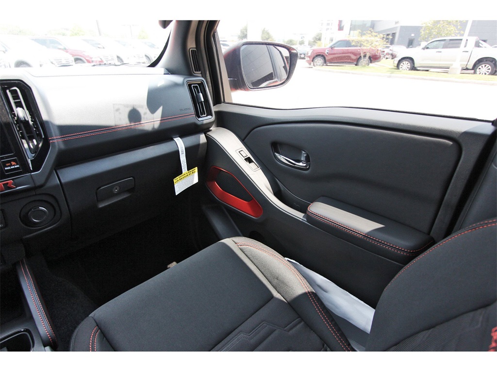 2025 Nissan Frontier PRO-4X Orange at Central Houston Nissan