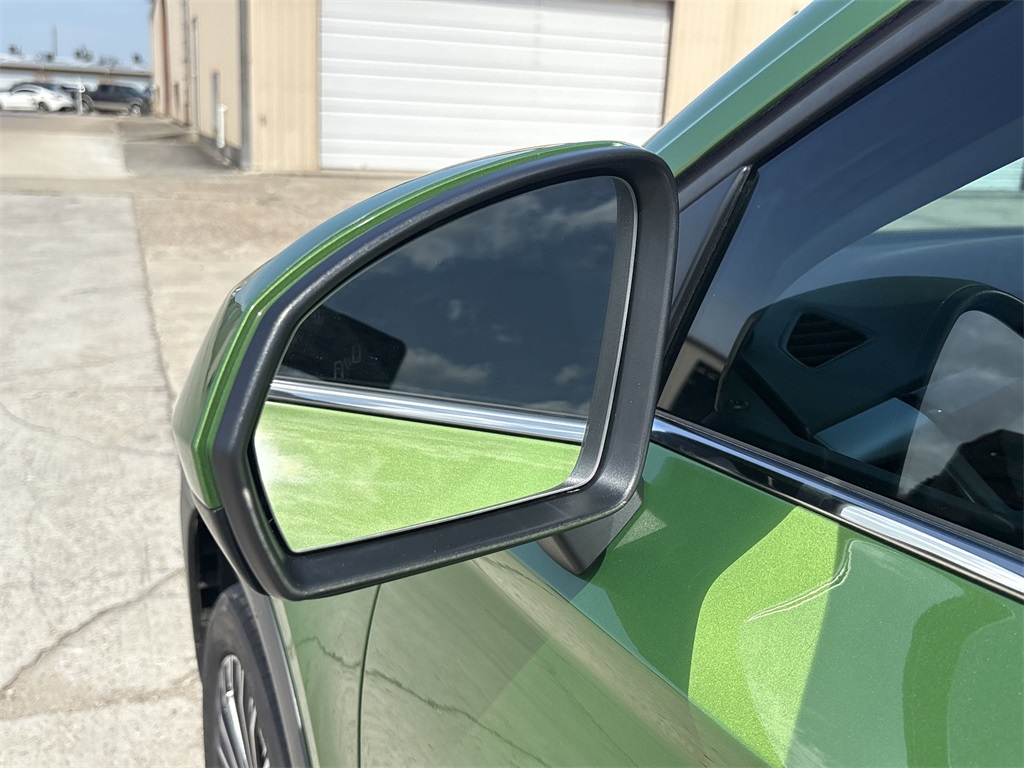 2025 Volkswagen Taos 1.5T SE Green at DeMontrond Auto Country