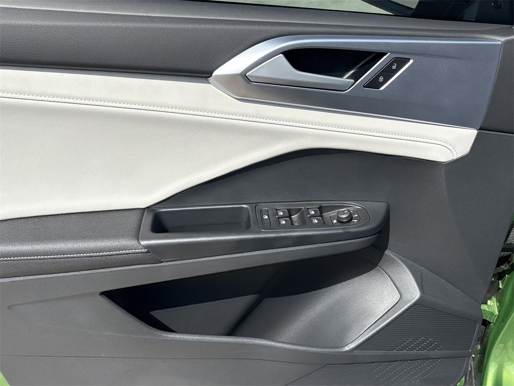 2025 Volkswagen Taos 1.5T SE Green at DeMontrond Auto Country