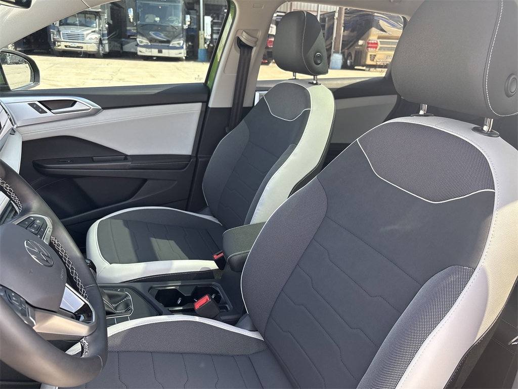 2025 Volkswagen Taos 1.5T SE Green at DeMontrond Auto Country