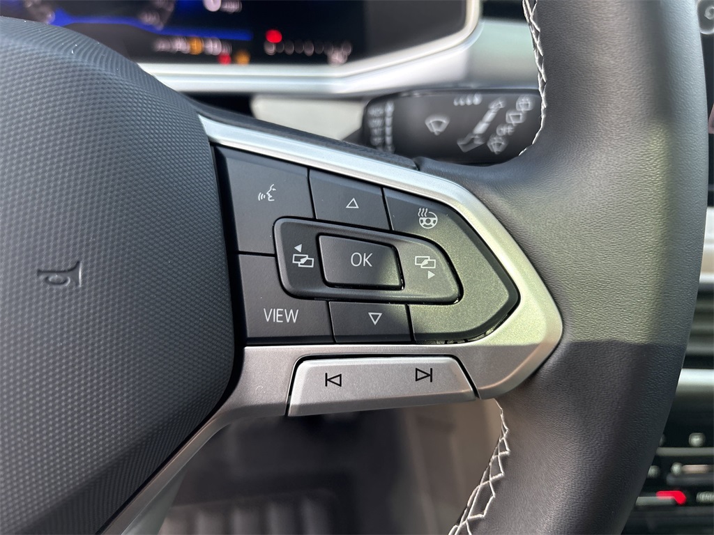 2025 Volkswagen Taos 1.5T SE Green at DeMontrond Auto Country