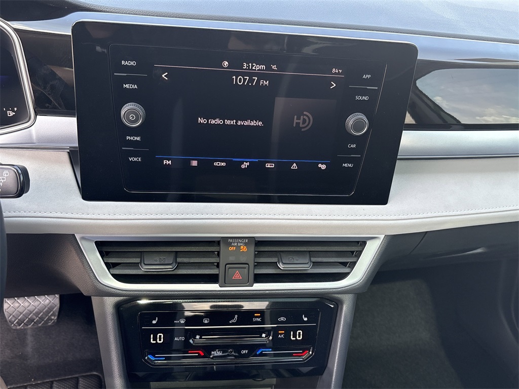 2025 Volkswagen Taos 1.5T SE Green at DeMontrond Auto Country