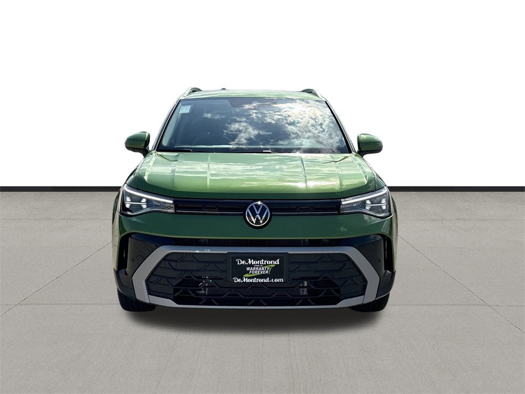 2025 Volkswagen Taos 1.5T SE Green at DeMontrond Auto Country