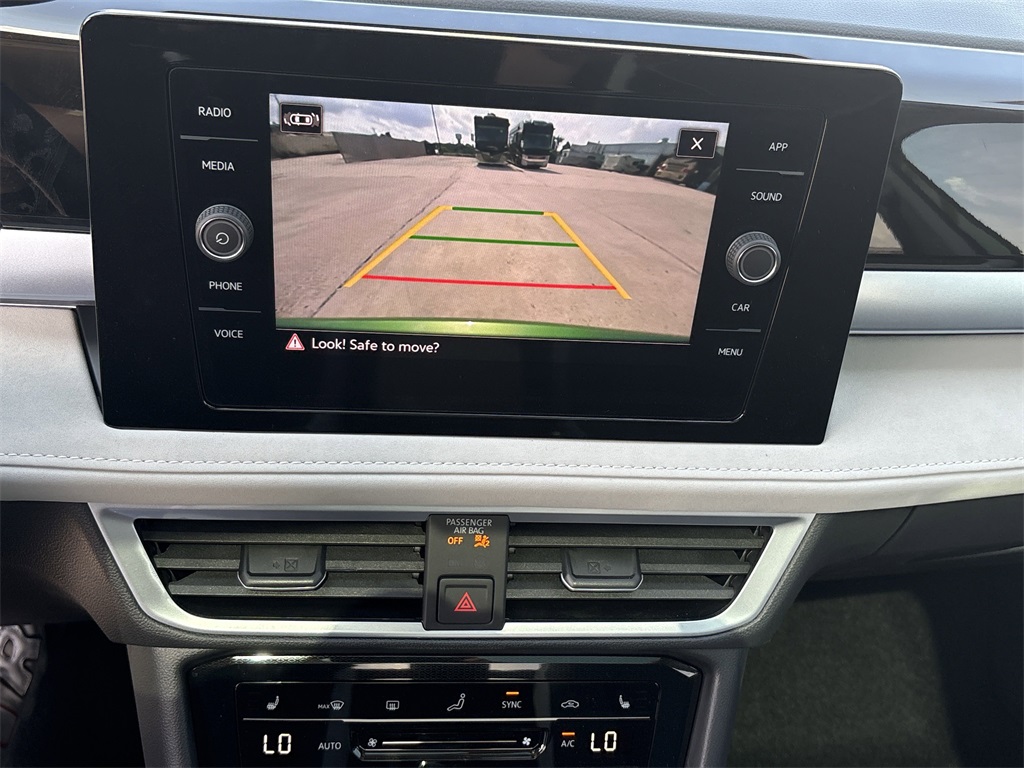 2025 Volkswagen Taos 1.5T SE Green at DeMontrond Auto Country