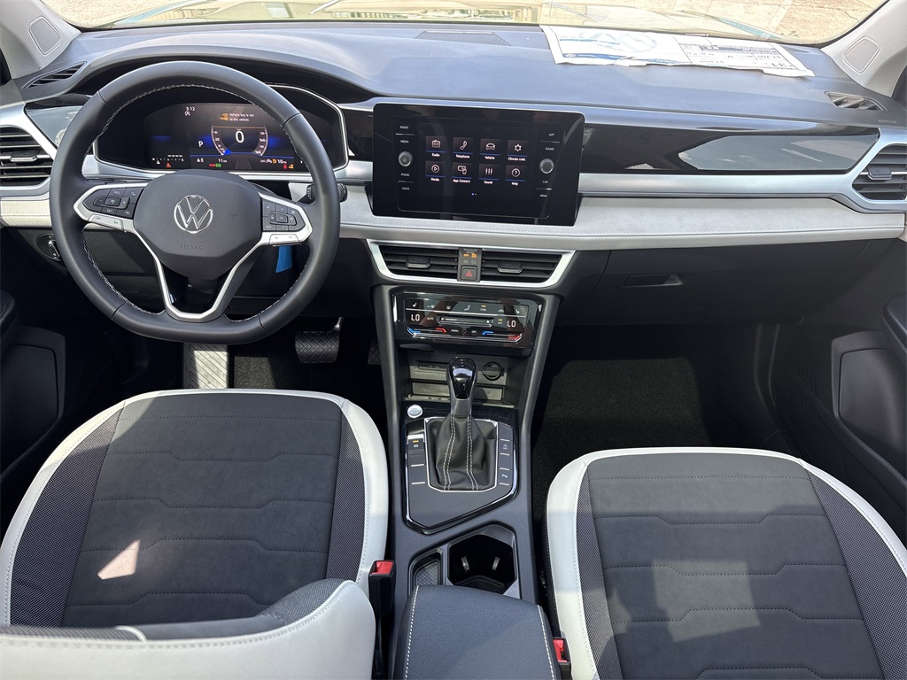 2025 Volkswagen Taos 1.5T SE Green at DeMontrond Auto Country